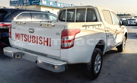 Buy Import Mitsubishi L200 White Car in Import - Dubai in A'ana Buy Import Mitsubishi L200 White Car in Import - Dubai in A'ana