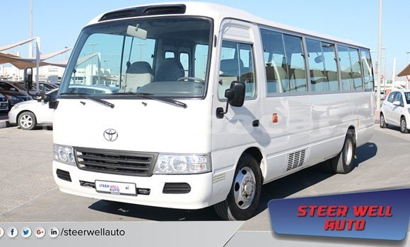 Acheter Import Voiture Toyota Coaster Blanc à Import - Dubai, A'ana Acheter Import Voiture Toyota Coaster Blanc à Import - Dubai, A'ana