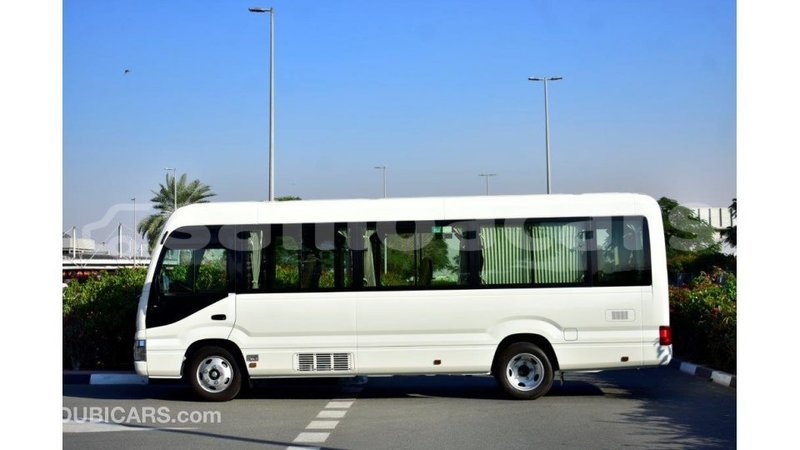 Big with watermark toyota coaster a'ana import dubai 2945