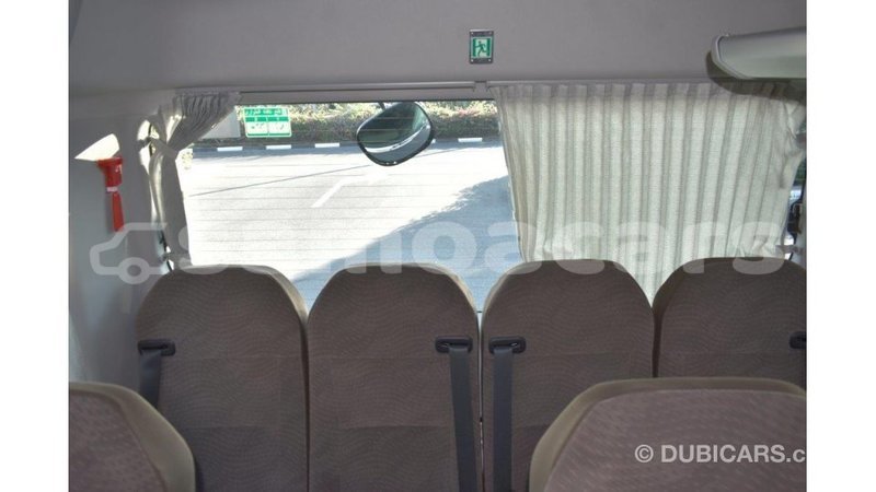 Big with watermark toyota coaster a'ana import dubai 2945