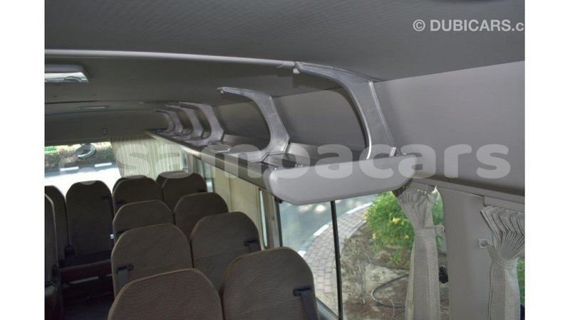 Big with watermark toyota coaster a'ana import dubai 2945