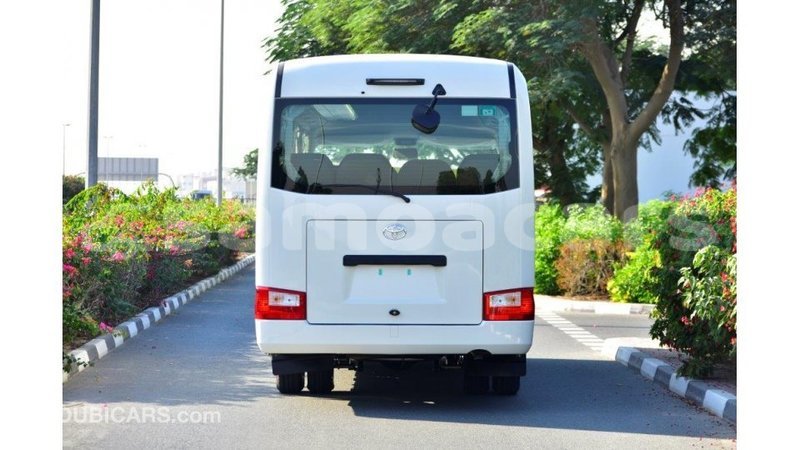 Big with watermark toyota coaster a'ana import dubai 2945