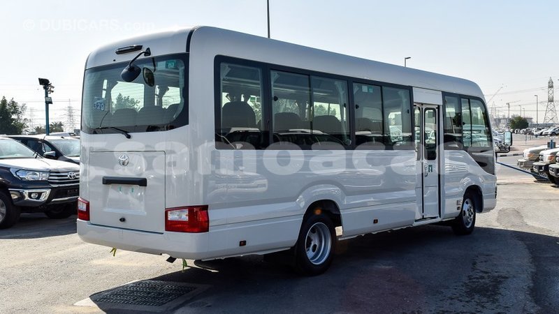 Big with watermark toyota coaster a'ana import dubai 3078