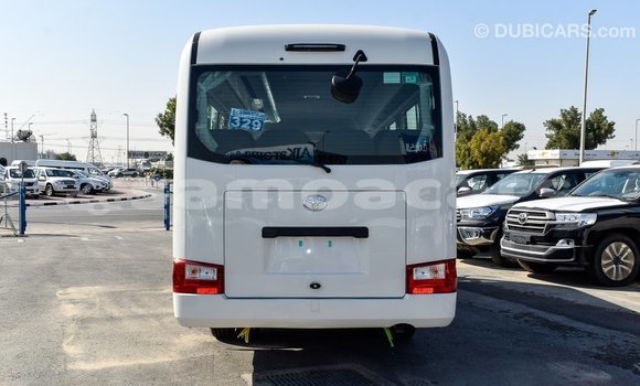 Acheter Import Voiture Toyota Coaster Blanc à Import - Dubai, A'ana Acheter Import Voiture Toyota Coaster Blanc à Import - Dubai, A'ana