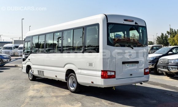 Acheter Import Voiture Toyota Coaster Blanc à Import - Dubai, A'ana Acheter Import Voiture Toyota Coaster Blanc à Import - Dubai, A'ana