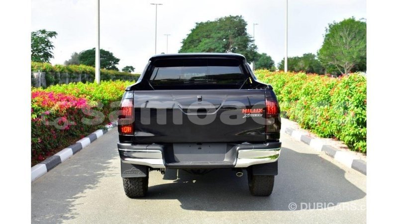 Big with watermark toyota hilux a'ana import dubai 3095