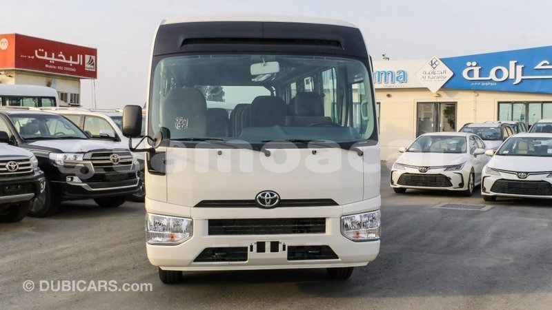 Big with watermark toyota coaster a'ana import dubai 3136