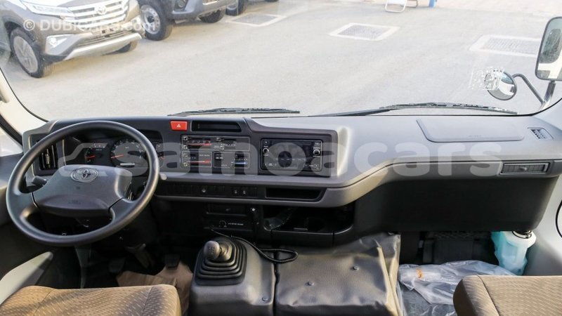 Big with watermark toyota coaster a'ana import dubai 3136