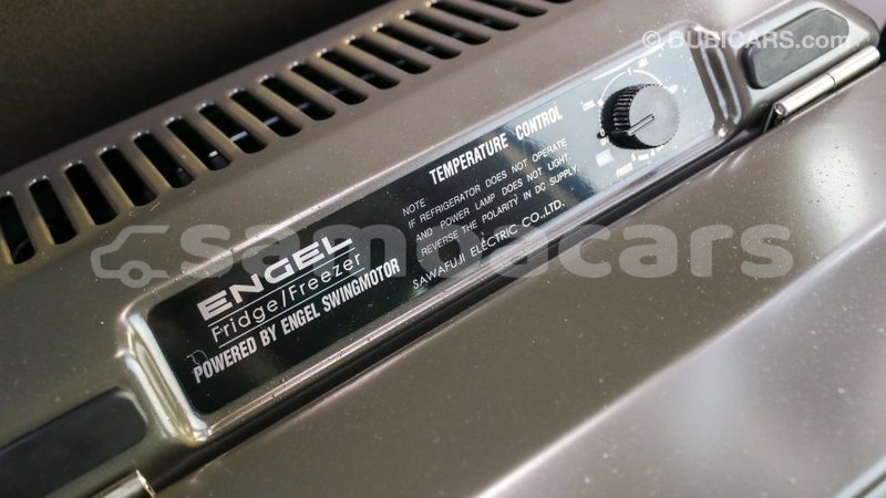 Big with watermark toyota coaster a'ana import dubai 3136