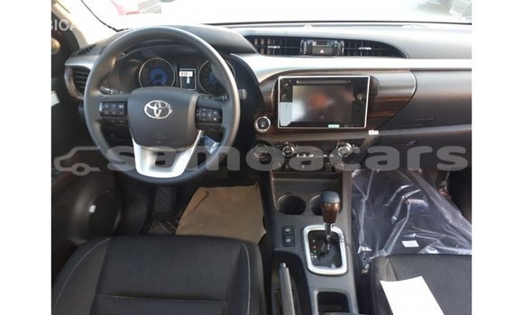 Buy Import Toyota Hilux Red Car in Import - Dubai in A'ana Buy Import Toyota Hilux Red Car in Import - Dubai in A'ana
