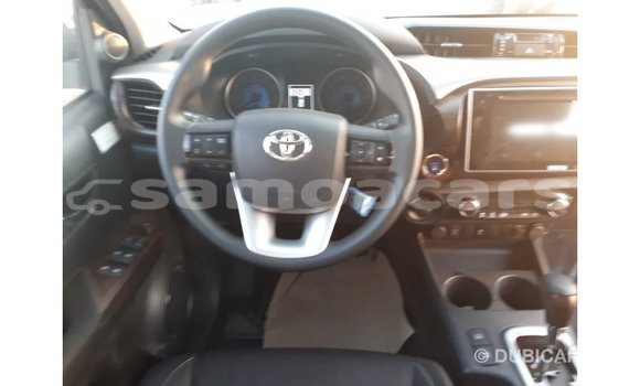 Buy Import Toyota Hilux Red Car in Import - Dubai in A'ana Buy Import Toyota Hilux Red Car in Import - Dubai in A'ana