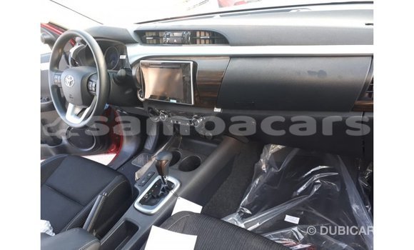 Buy Import Toyota Hilux Red Car in Import - Dubai in A'ana Buy Import Toyota Hilux Red Car in Import - Dubai in A'ana