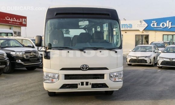 Acheter Import Voiture Toyota Coaster Blanc à Import - Dubai, A'ana Acheter Import Voiture Toyota Coaster Blanc à Import - Dubai, A'ana