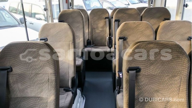 Big with watermark toyota coaster a ana import dubai 3284
