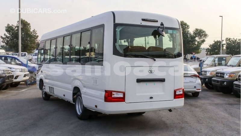 Big with watermark toyota coaster a ana import dubai 3284
