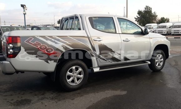 Buy Import Mitsubishi L200 White Car in Import - Dubai in A'ana Buy Import Mitsubishi L200 White Car in Import - Dubai in A'ana