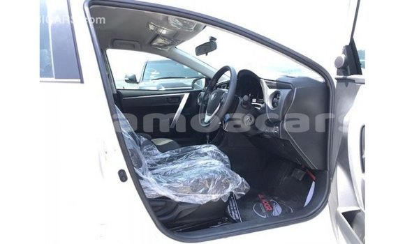 Buy Import Toyota Corolla White Car in Import - Dubai in A'ana Buy Import Toyota Corolla White Car in Import - Dubai in A'ana