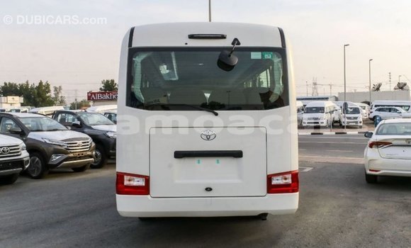 Acheter Import Voiture Toyota Coaster Blanc à Import - Dubai, A'ana Acheter Import Voiture Toyota Coaster Blanc à Import - Dubai, A'ana