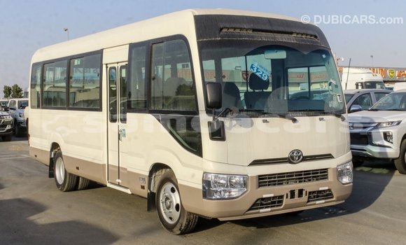 Acheter Import Voiture Toyota Coaster Blanc à Import - Dubai, A'ana Acheter Import Voiture Toyota Coaster Blanc à Import - Dubai, A'ana