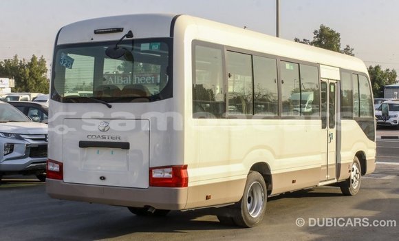 Acheter Import Voiture Toyota Coaster Blanc à Import - Dubai, A'ana Acheter Import Voiture Toyota Coaster Blanc à Import - Dubai, A'ana