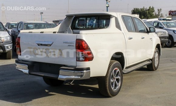 Buy Import Toyota Hilux White Car in Import - Dubai in A'ana Buy Import Toyota Hilux White Car in Import - Dubai in A'ana