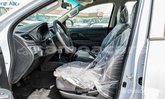 Acheter Import Voiture Mitsubishi L200 Blanc à Import - Dubai, A'ana Acheter Import Voiture Mitsubishi L200 Blanc à Import - Dubai, A'ana