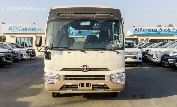 Acheter Import Voiture Toyota Coaster Blanc à Import - Dubai, A'ana Acheter Import Voiture Toyota Coaster Blanc à Import - Dubai, A'ana