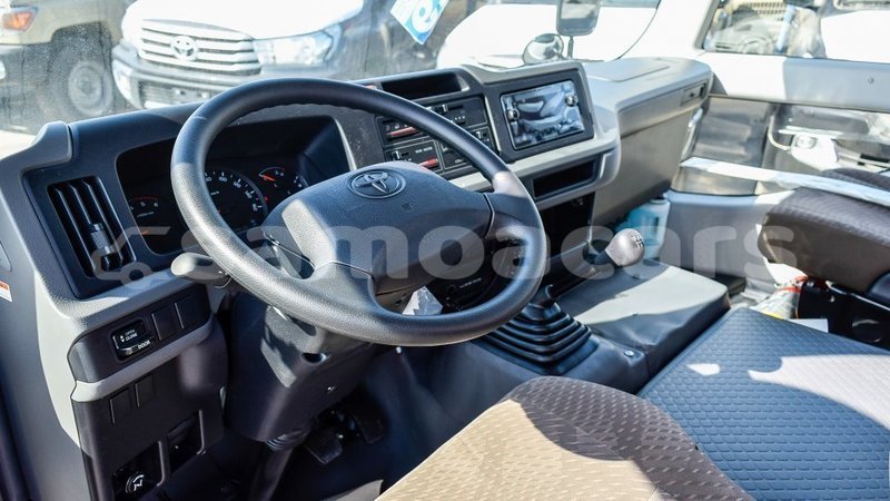 Big with watermark toyota coaster a ana import dubai 4221