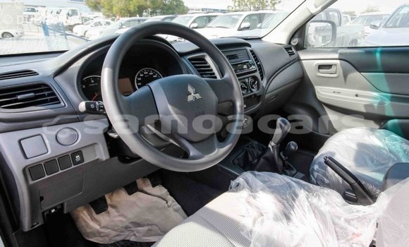 Buy Import Mitsubishi L200 White Car in Import - Dubai in A'ana Buy Import Mitsubishi L200 White Car in Import - Dubai in A'ana