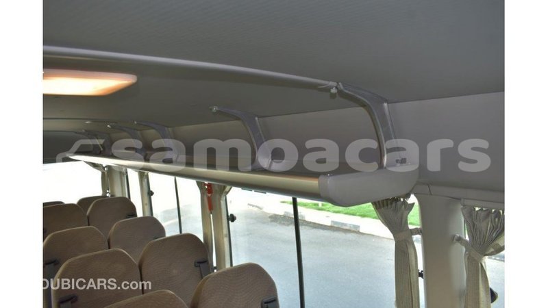 Big with watermark toyota coaster a ana import dubai 4369