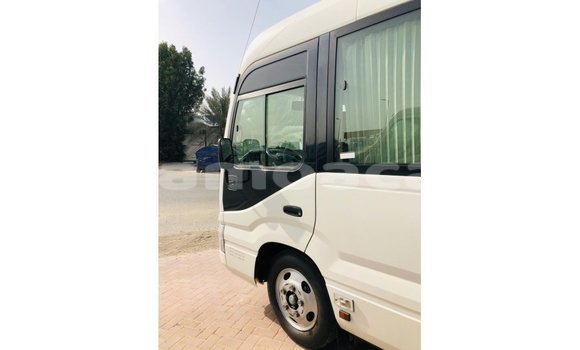 Acheter Import Voiture Toyota Coaster Blanc à Import - Dubai, A'ana Acheter Import Voiture Toyota Coaster Blanc à Import - Dubai, A'ana
