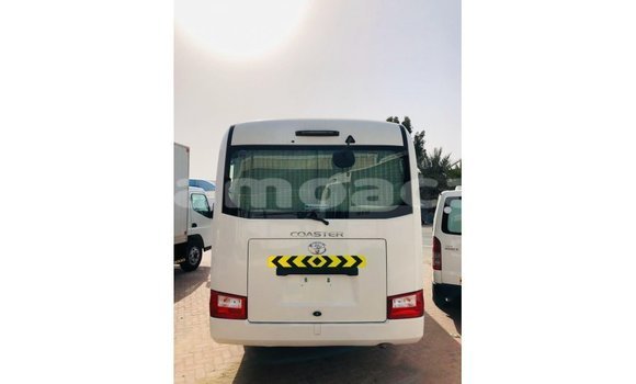 Acheter Import Voiture Toyota Coaster Blanc à Import - Dubai, A'ana Acheter Import Voiture Toyota Coaster Blanc à Import - Dubai, A'ana