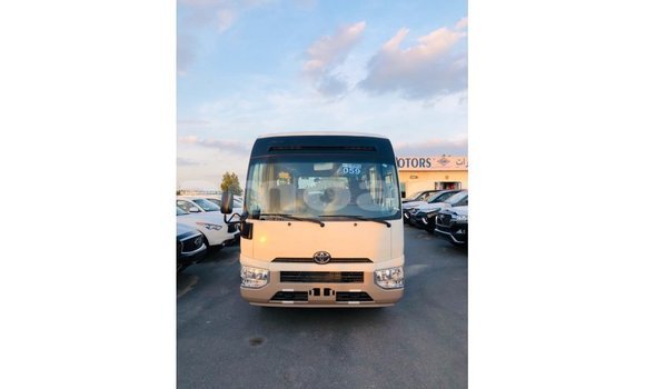 Buy Import Toyota Coaster White Car in Import - Dubai in A'ana