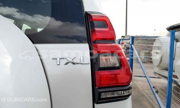 Buy Import Toyota Prado White Car in Import - Dubai in A'ana Buy Import Toyota Prado White Car in Import - Dubai in A'ana